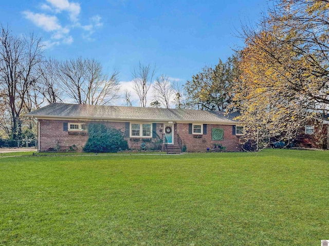 ranch-style house with a front lawn