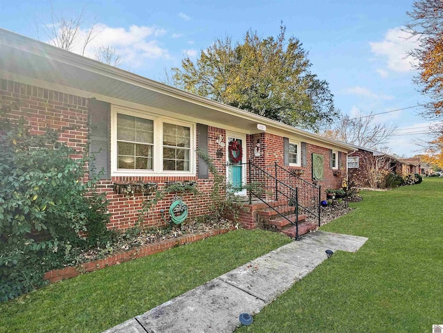 single story home with a front yard