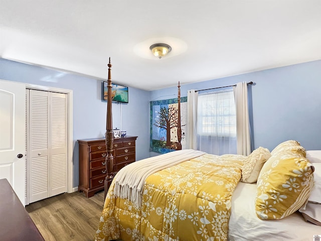 bedroom featuring a closet and light hardwood / wood-style flooring