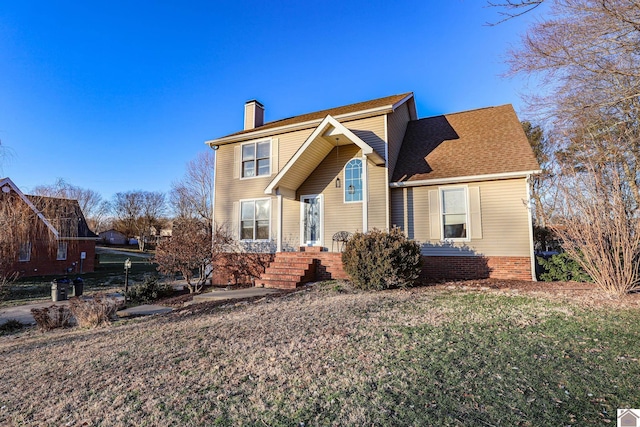 view of front property with a front yard