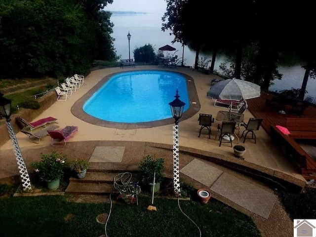 view of pool featuring a patio