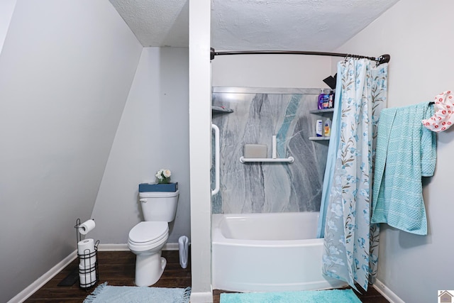 bathroom featuring hardwood / wood-style flooring, a textured ceiling, toilet, and shower / bath combo