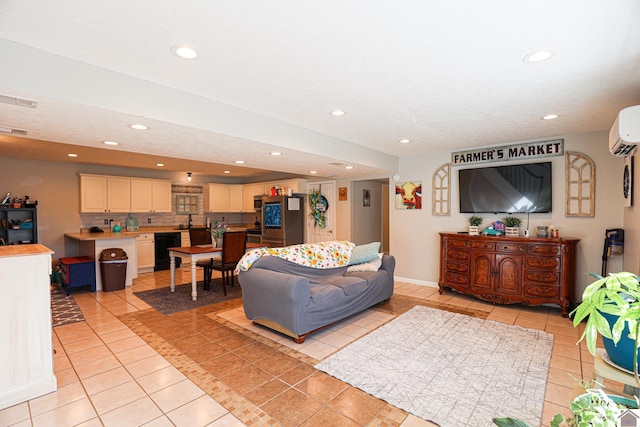 tiled living room featuring an AC wall unit