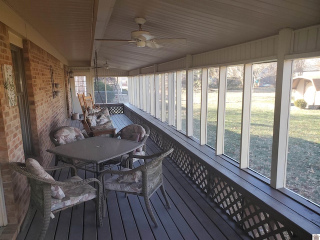 sunroom / solarium with lofted ceiling