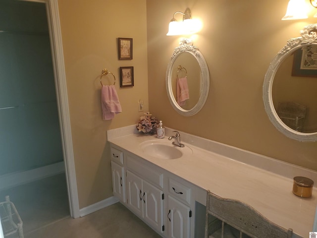 bathroom with vanity and tile patterned flooring