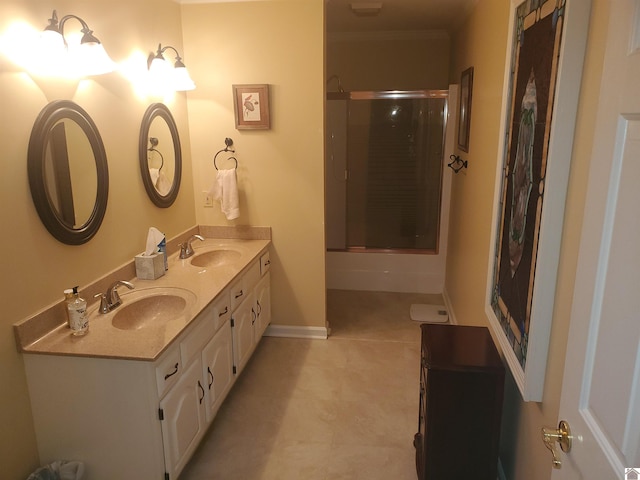 bathroom featuring tile patterned flooring, walk in shower, and vanity