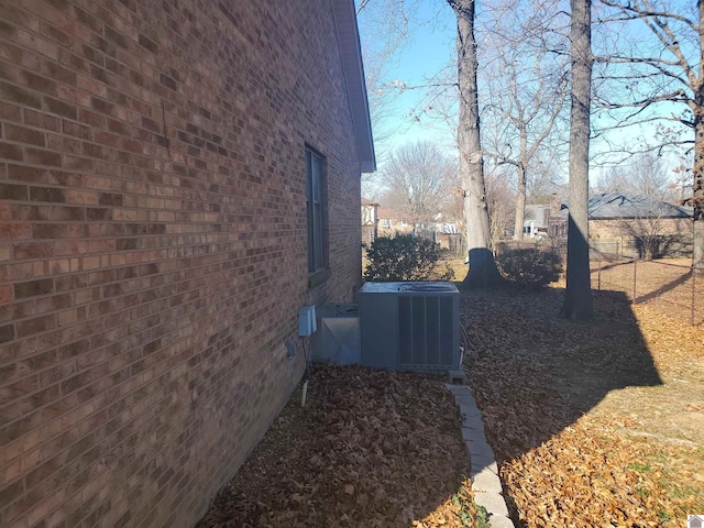 view of property exterior with central AC unit