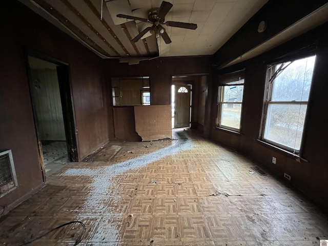 spare room with ceiling fan and heating unit