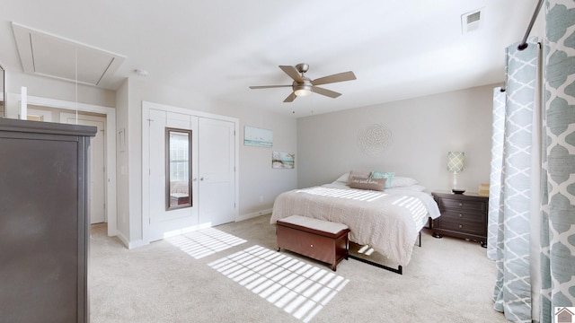 carpeted bedroom featuring ceiling fan