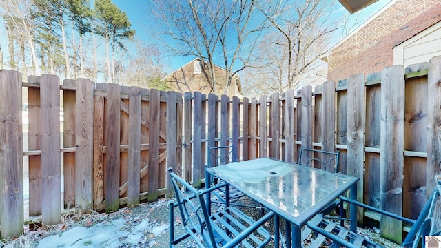 view of snow covered patio