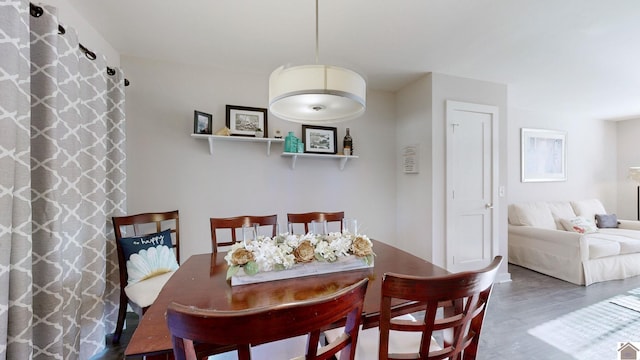 dining area featuring hardwood / wood-style floors