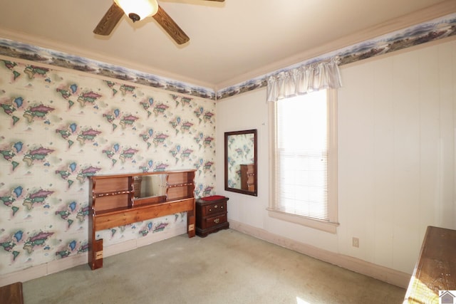 interior space with ceiling fan and light colored carpet