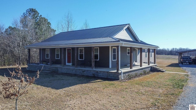 farmhouse inspired home featuring covered porch