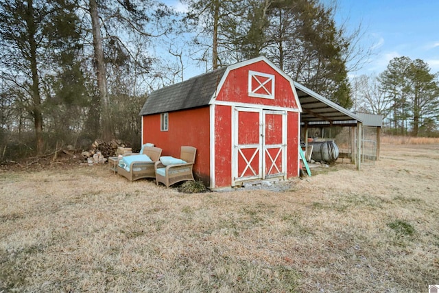 view of outdoor structure with a yard