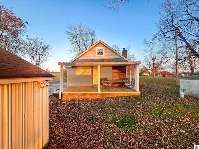 back of property featuring a patio area