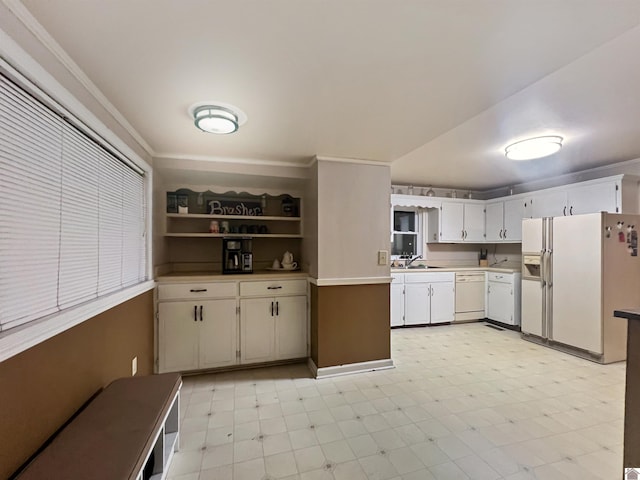 kitchen featuring white cabinets, white appliances, ornamental molding, and sink