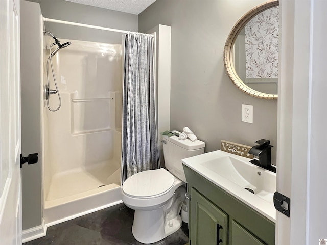 bathroom featuring vanity, toilet, a textured ceiling, and a shower with curtain