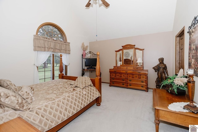 bedroom featuring carpet, high vaulted ceiling, and ceiling fan