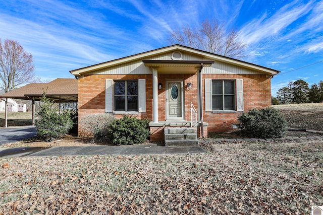 view of front of house featuring a carport