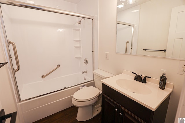 full bathroom featuring hardwood / wood-style floors, shower / tub combination, toilet, and vanity