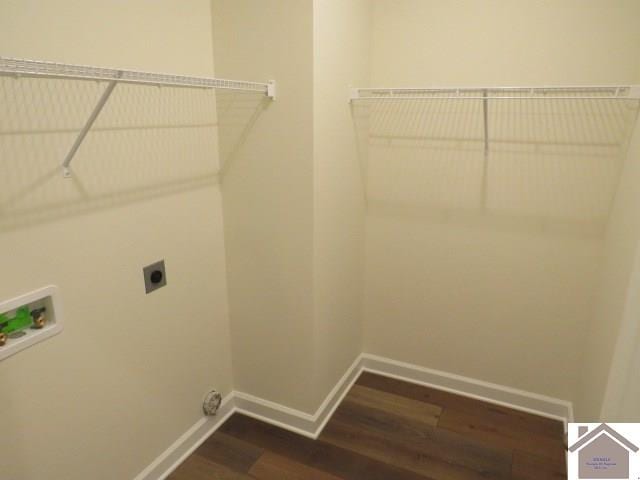 laundry area with hookup for a washing machine, dark hardwood / wood-style floors, and hookup for an electric dryer