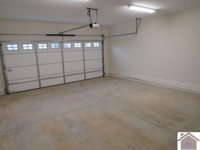 garage featuring a garage door opener