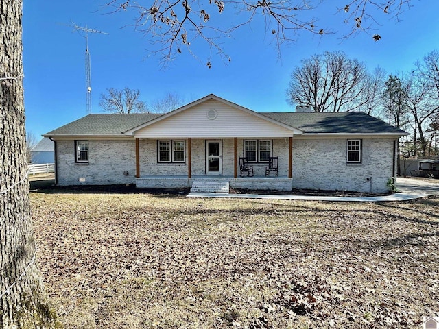 ranch-style home with a porch