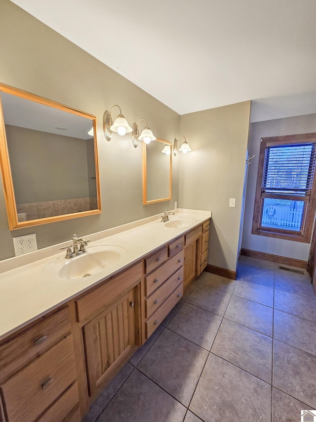 bathroom featuring vanity and tile patterned floors