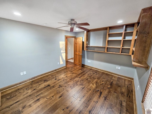 unfurnished bedroom featuring wood-type flooring and ceiling fan