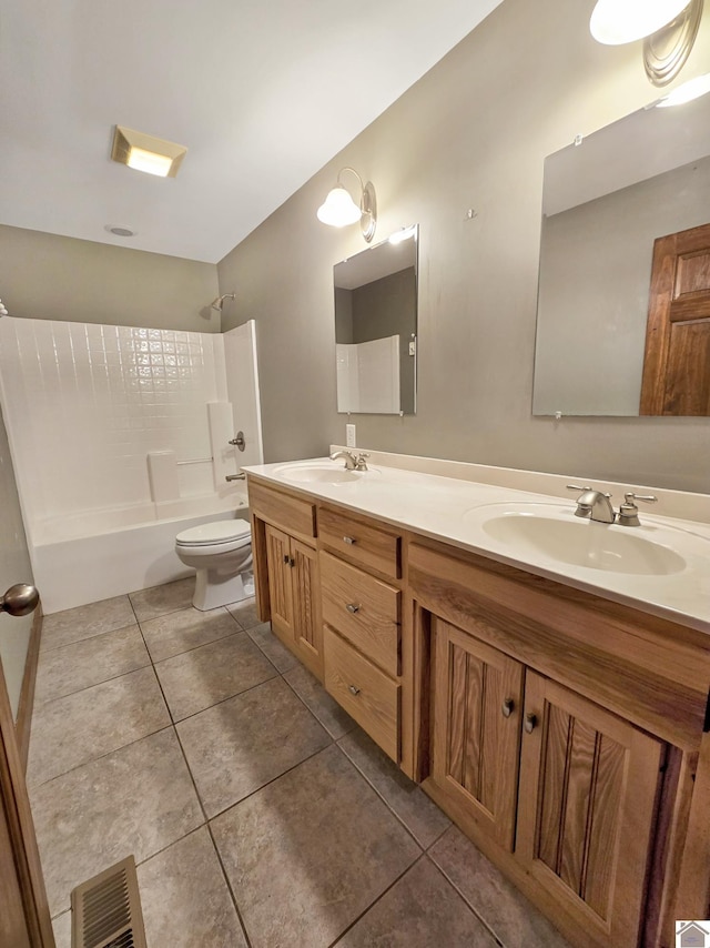 full bathroom with vanity, tile patterned flooring, tub / shower combination, and toilet