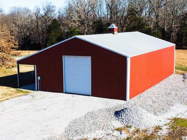 view of outbuilding featuring a garage