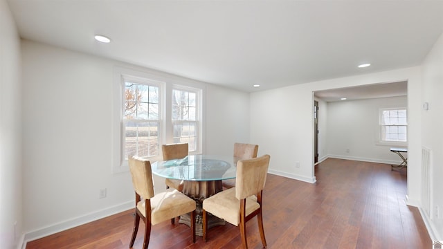 dining room featuring dark hardwood / wood-style flooring