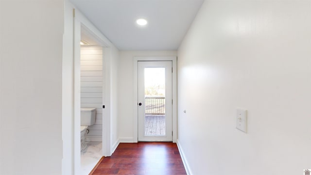 doorway featuring dark hardwood / wood-style floors