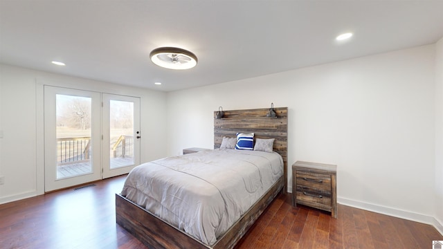 bedroom featuring access to exterior and dark wood-type flooring