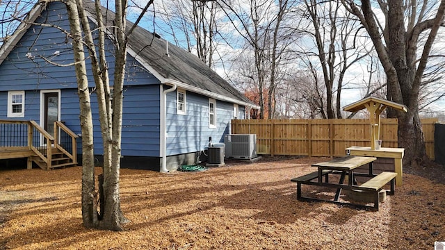 view of yard with central AC unit