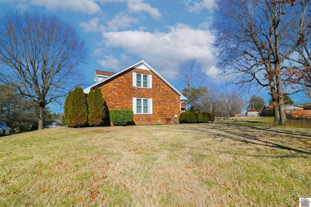 view of property exterior featuring a lawn