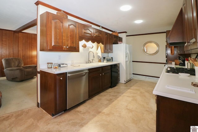 kitchen featuring sink, custom exhaust hood, crown molding, stainless steel dishwasher, and wooden walls