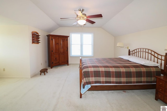 carpeted bedroom featuring ceiling fan and lofted ceiling