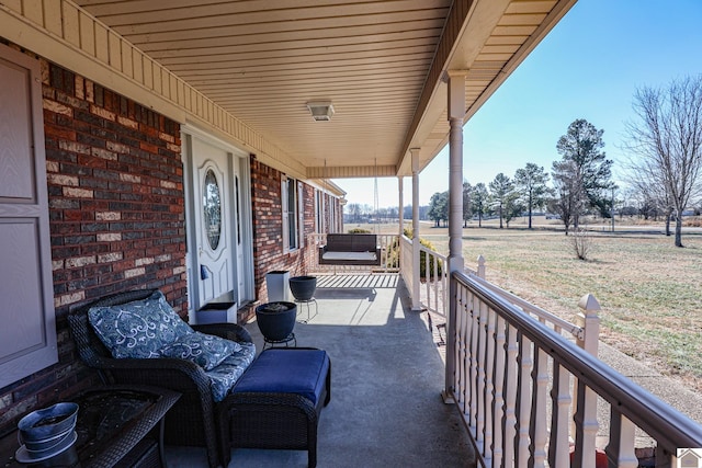 view of patio featuring a porch