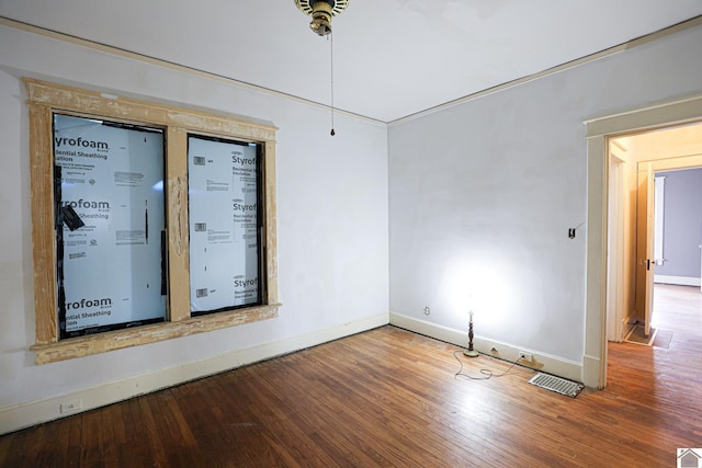 spare room featuring hardwood / wood-style floors