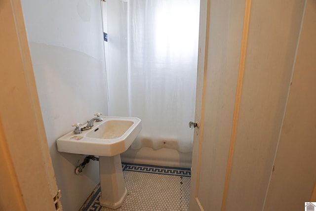 bathroom with tile patterned flooring