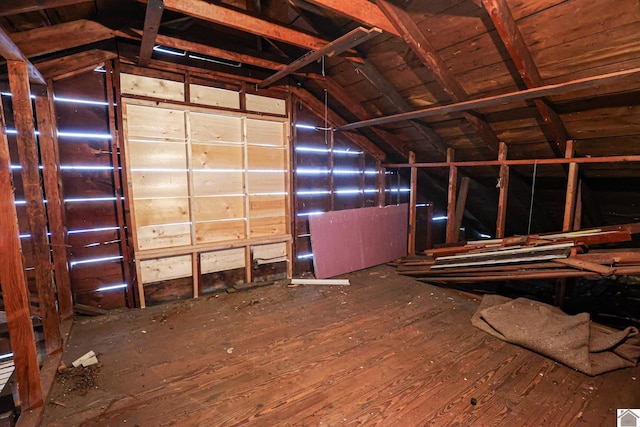 misc room featuring lofted ceiling