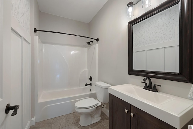 full bathroom with vanity, tub / shower combination, and toilet