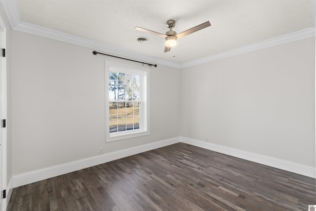 empty room featuring crown molding, dark wood-type flooring, and ceiling fan