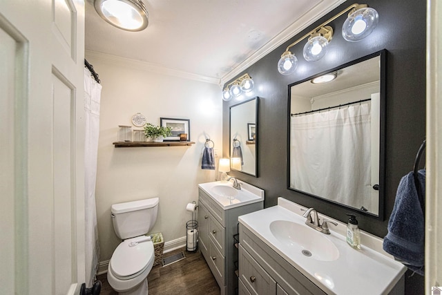 bathroom featuring crown molding, vanity, toilet, and hardwood / wood-style flooring