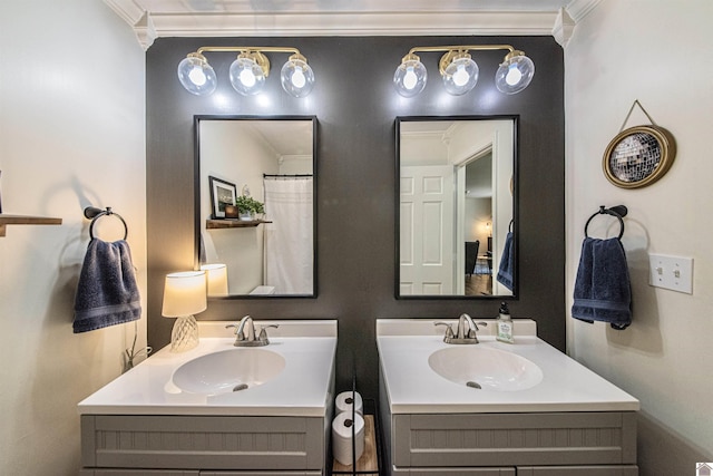 bathroom with crown molding and vanity