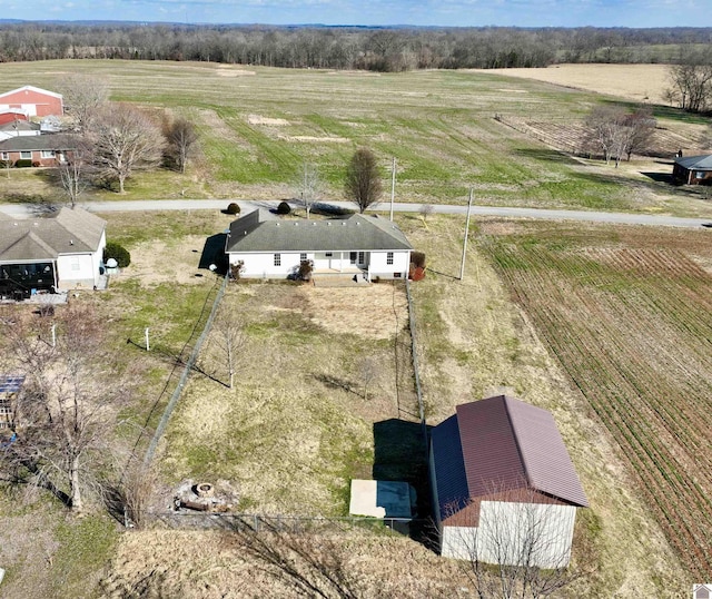 birds eye view of property featuring a rural view