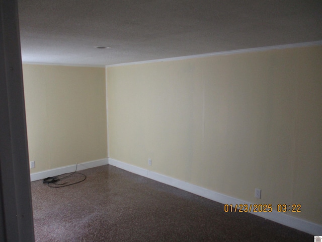 spare room featuring ornamental molding