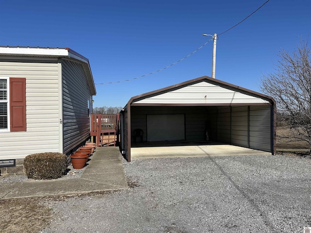 garage with a carport