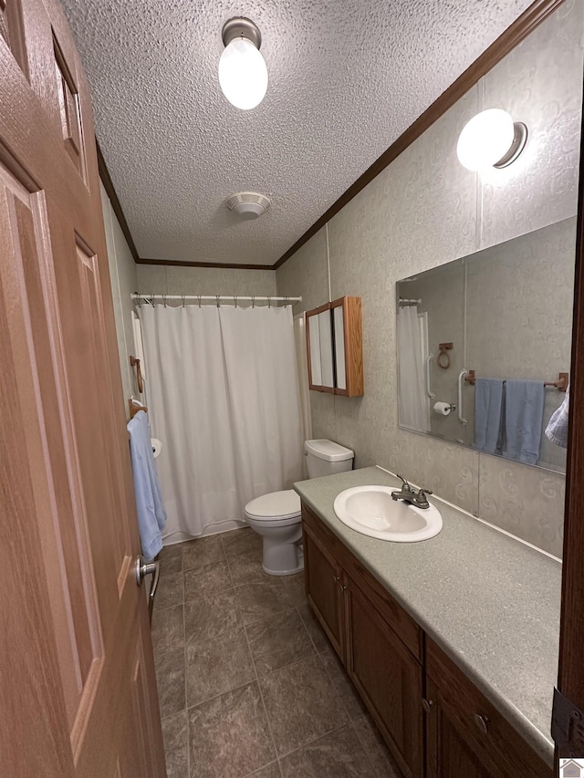 bathroom with toilet, a textured ceiling, ornamental molding, vanity, and a shower with shower curtain